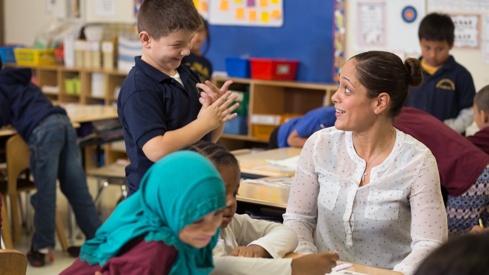 Teacher with students