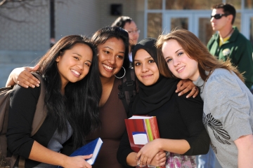 Group of smiling Mercy students