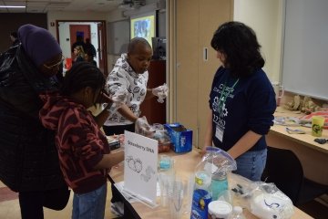 Middle school students engage in hands-on STEM activities at Mercy University's Bronx campus at the Spring Open House for the Verizon Innovative Learning STEM Achievers Program