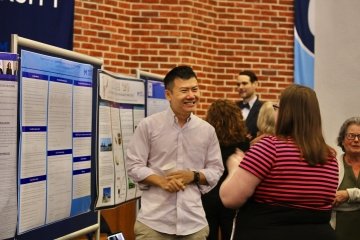 Mercy University faculty showcase their work during Faculty Recognition Poster Session