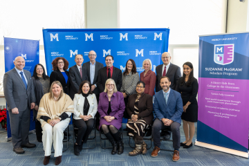 Mercy University leadership and staff and members of the Suzanne McGraw Foundation pose at launch of the Suzanne McGraw Scholars Program