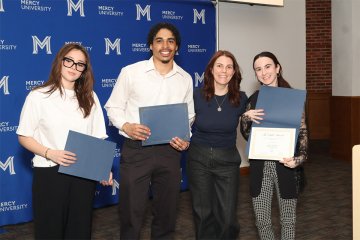 Mercy University student and faculty at 42nd Annual Quill Awards
