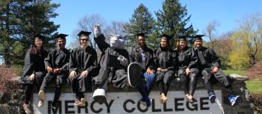 Graduates at DF campus entrance