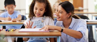 Teacher with student