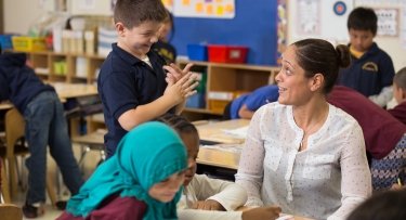 Teacher with students