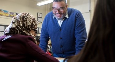 teacher engaged with students