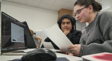 Mercy University students working on Red Hyacinth magazine