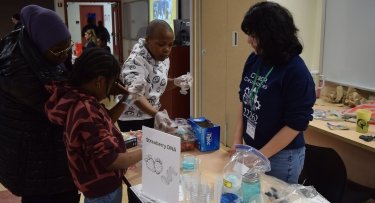 Middle school students engage in hands-on STEM activities at Mercy University's Bronx campus at the Spring Open House for the Verizon Innovative Learning STEM Achievers Program