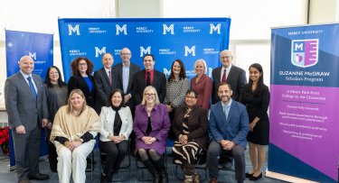 Mercy University leadership and staff and members of the Suzanne McGraw Foundation pose at launch of the Suzanne McGraw Scholars Program