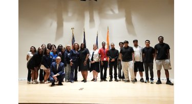 Mercy University High School Scholars and Influencers program participants and leadership pose at their completion ceremony in the Bronx Campus