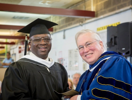 President Hall confers degrees for graduating class at Sing Sing Correctional Facility