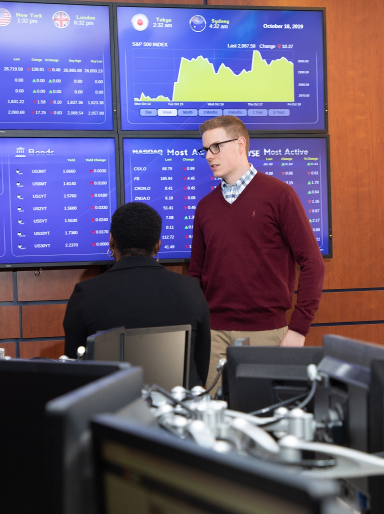 Business students in trading room