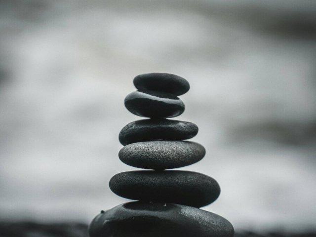 Photo of dark gray stacked rocks