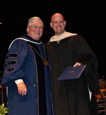 Commencement Photo of President Hall and Daniel R. Black