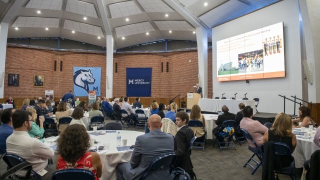 Attendees at second annual Converge conference held at Mercy University's Westchester Campus