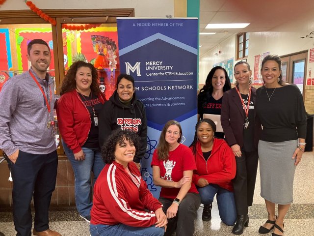 Jefferson Teachers with STEM banner