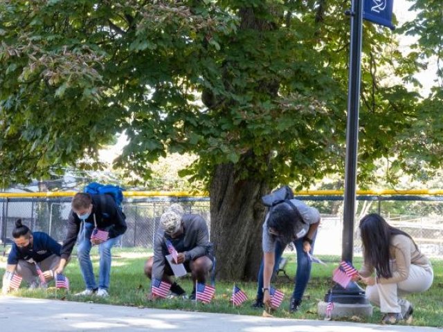 Students planting flags